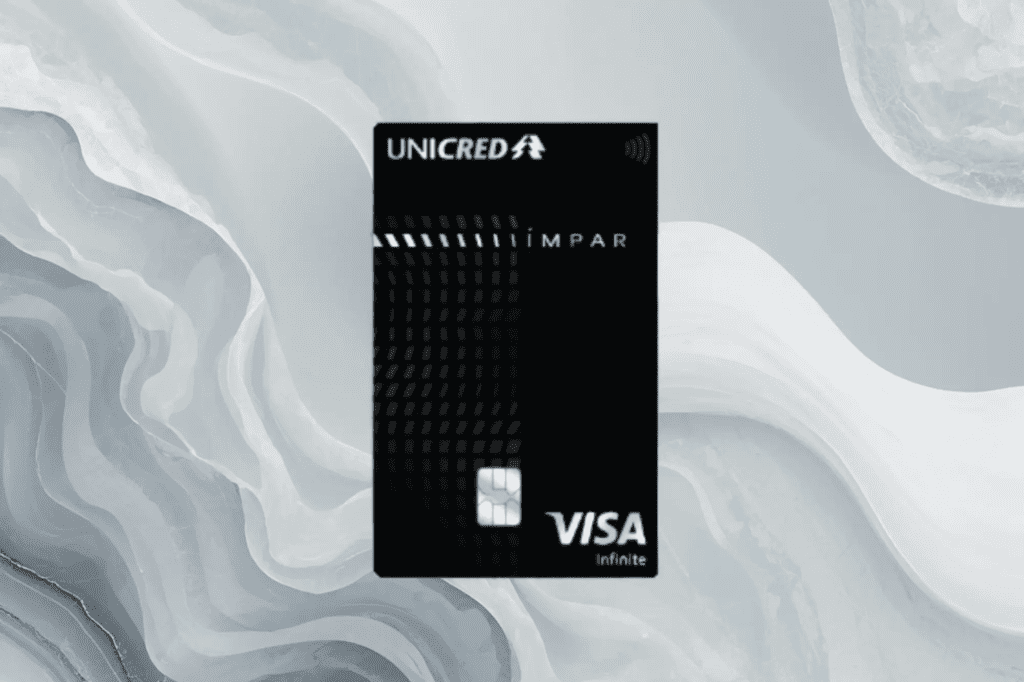 Cartão Unicred Ímpar Visa Infinite preto metálico com fundo premium cinza claro