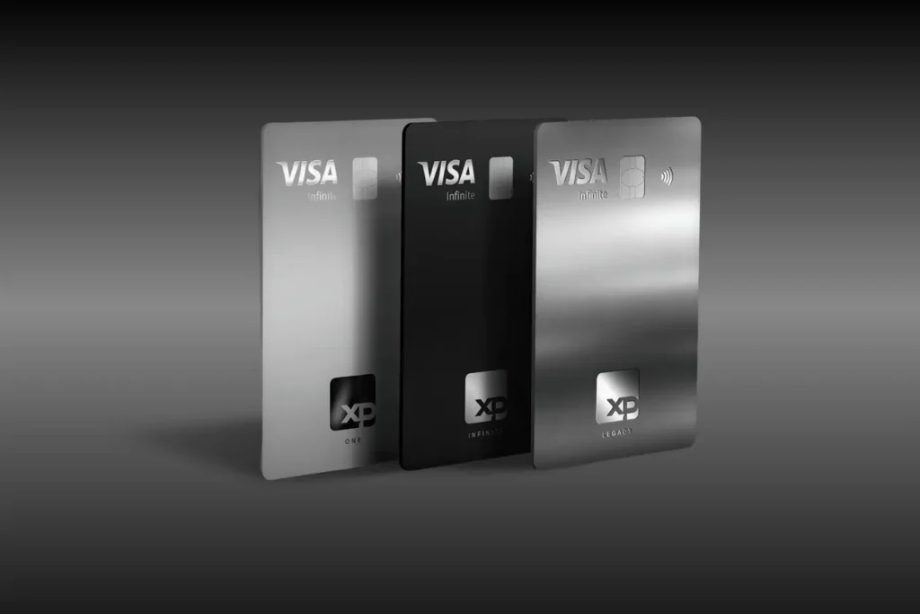 Cartões XP Visa Infinite One, Infinite e Legacy com benefícios premium, Investback, cashback e acesso a salas VIP em 2026.